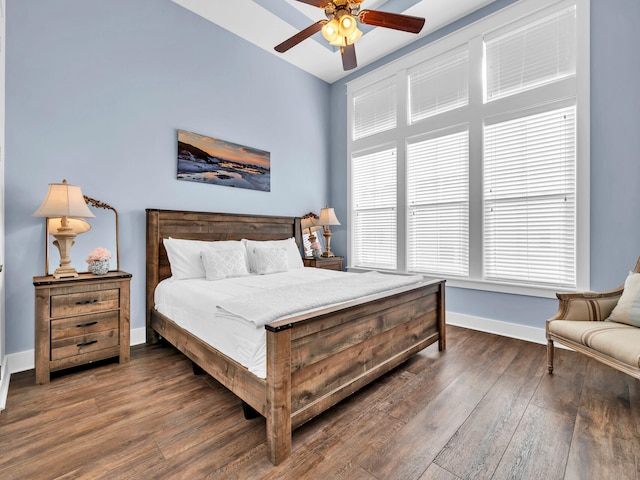 bedroom with dark wood-type flooring and ceiling fan