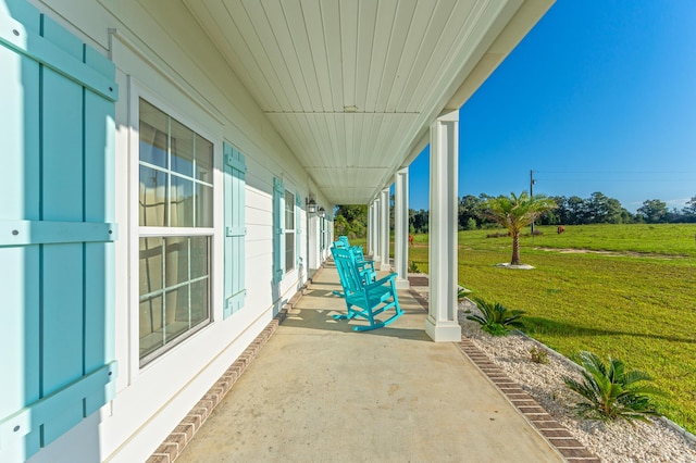 view of patio featuring a porch