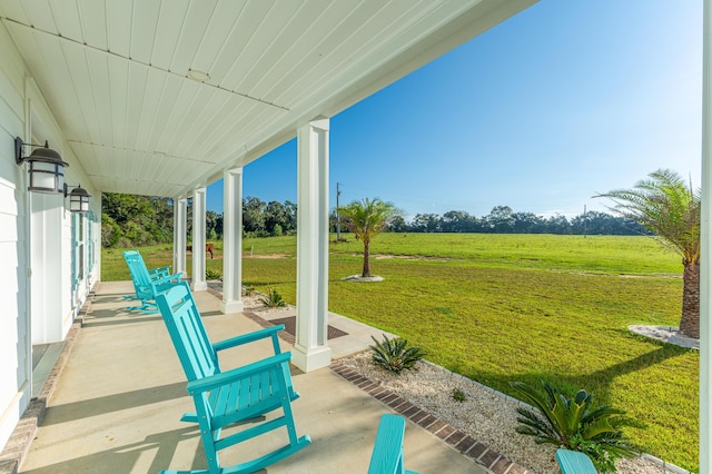 view of patio with a rural view