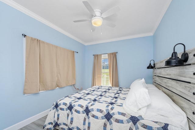 bedroom with crown molding, ceiling fan, and light wood-type flooring