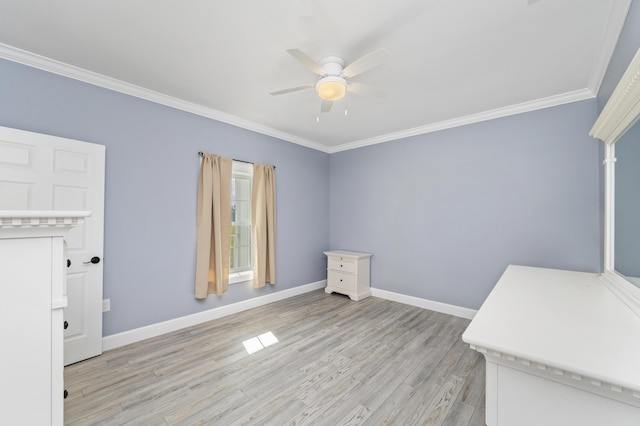 interior space with light hardwood / wood-style flooring, ornamental molding, and ceiling fan