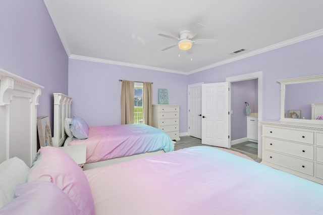 bedroom with crown molding, ceiling fan, ensuite bathroom, and light hardwood / wood-style floors