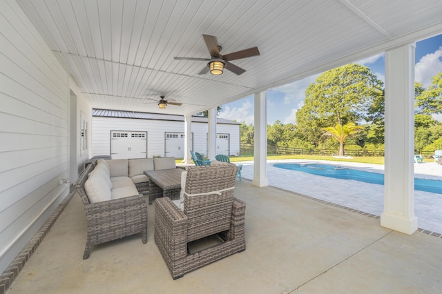 view of patio featuring an outdoor hangout area and ceiling fan