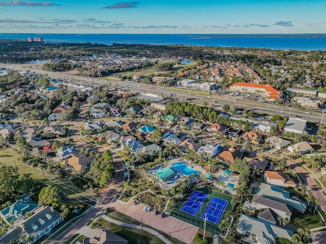 drone / aerial view with a water view