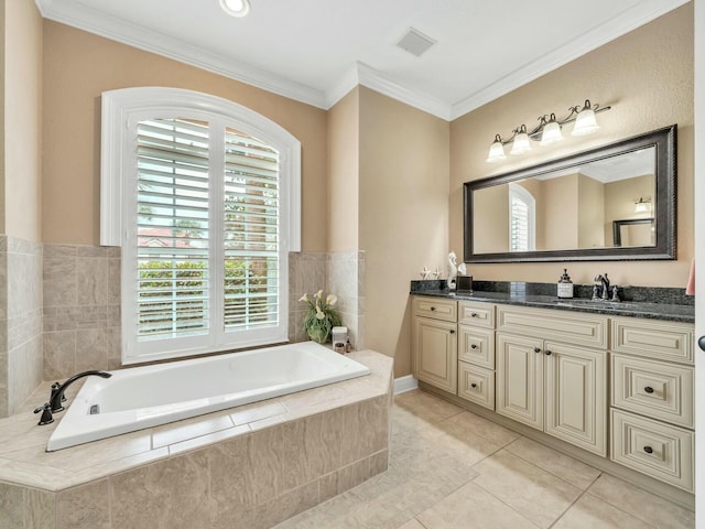 bathroom featuring vanity, tiled bath, tile patterned floors, and crown molding