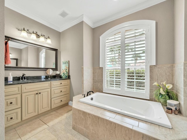 bathroom with tile patterned flooring, a relaxing tiled tub, crown molding, and vanity