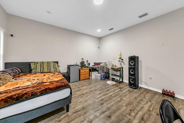 bedroom featuring hardwood / wood-style floors