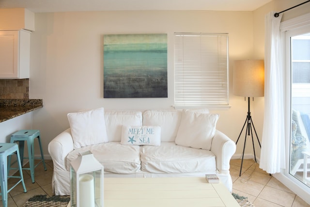 627 Eastern Lake Rd Unit 1, Santa Rosa Beach, FL 32459 - living area with light tile patterned floors and baseboards