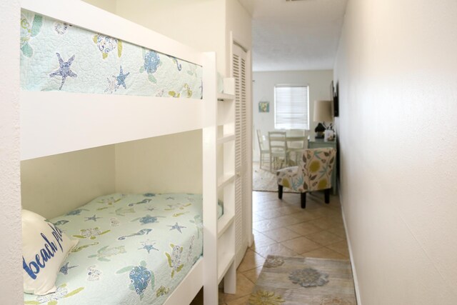 627 Eastern Lake Rd Unit 1, Santa Rosa Beach, FL 32459 - tiled bedroom featuring a closet