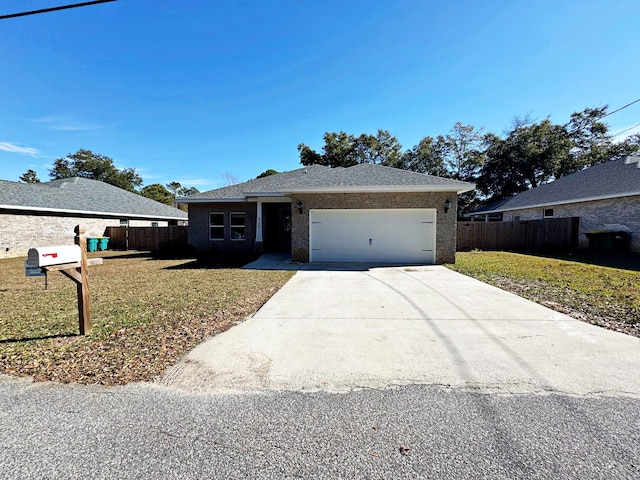 single story home featuring a garage and a front lawn