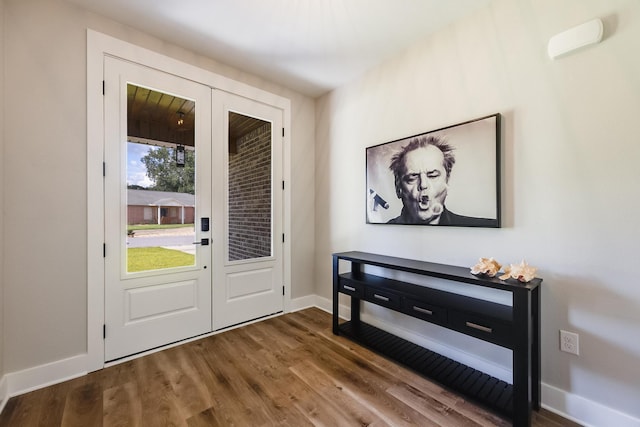 entrance foyer featuring hardwood / wood-style flooring