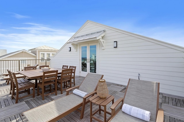 wooden deck featuring french doors