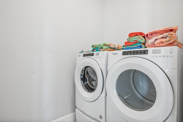 laundry area featuring independent washer and dryer