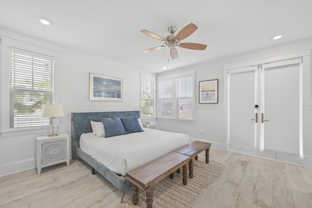 bedroom featuring ceiling fan and light wood-type flooring