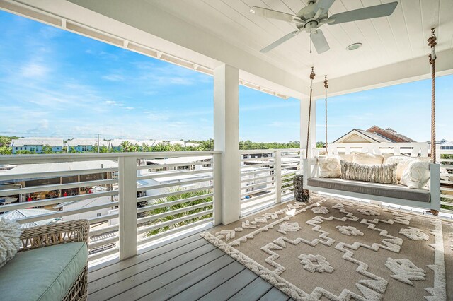 wooden terrace with ceiling fan