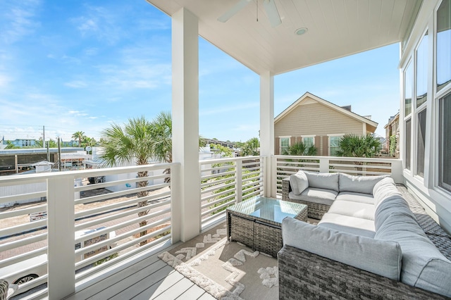 balcony with ceiling fan and an outdoor hangout area