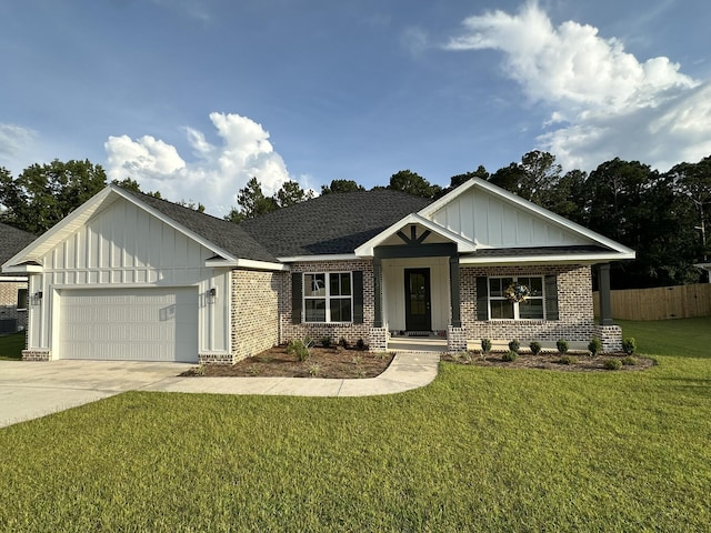 337 Shoal River Dr, Crestview, FL 32539 - view of front of home with brick siding, board and batten siding, an attached garage, concrete driveway, and a shingled roof