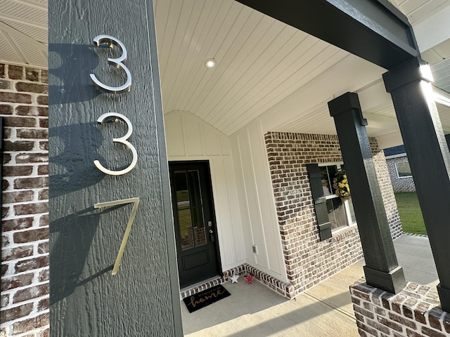 337 Shoal River Dr, Crestview, FL 32539 - doorway to property featuring brick siding and a porch