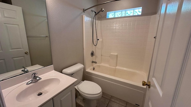 full bathroom with toilet, tile patterned floors, shower / washtub combination, and vanity