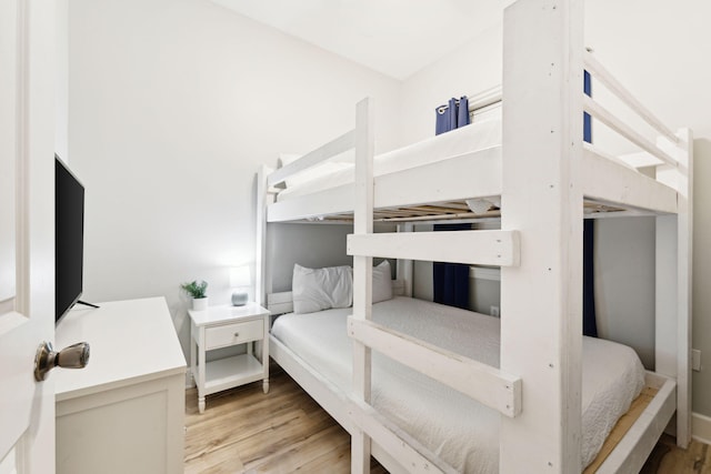 bedroom featuring light wood-type flooring