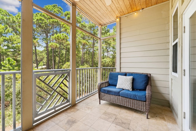 sunroom / solarium with wood ceiling