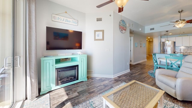 living room with dark wood-type flooring