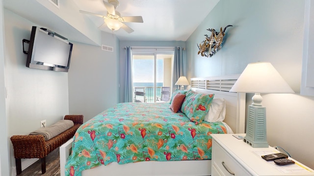 bedroom featuring access to outside, ceiling fan, and hardwood / wood-style flooring