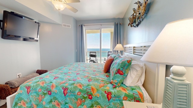 bedroom featuring ceiling fan and access to outside