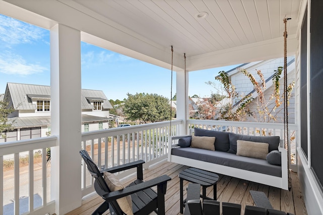 wooden deck featuring an outdoor hangout area