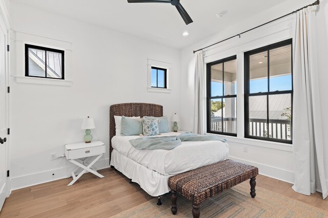 bedroom featuring ceiling fan and light wood-type flooring