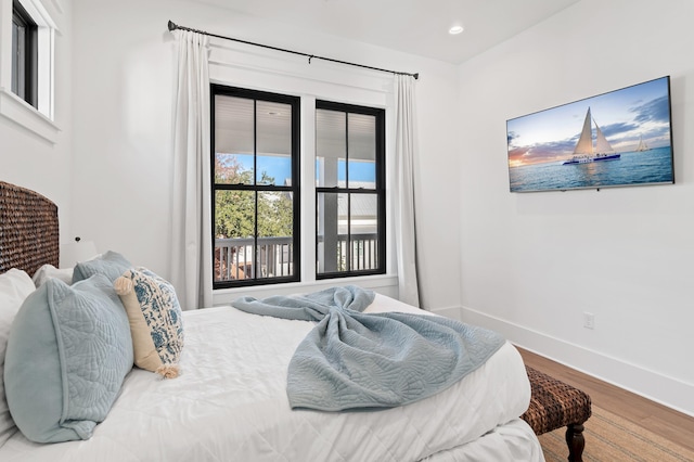 bedroom with wood-type flooring