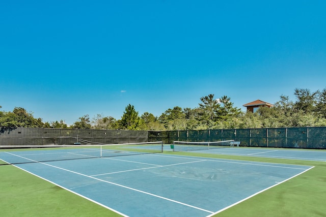 view of tennis court with basketball court