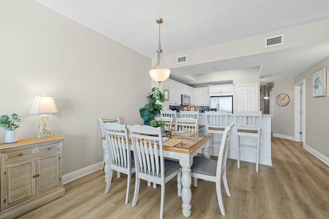 1111 Santa Rosa Blvd Unit 106, Fort Walton Beach, FL 32548 - dining space with light hardwood / wood-style flooring