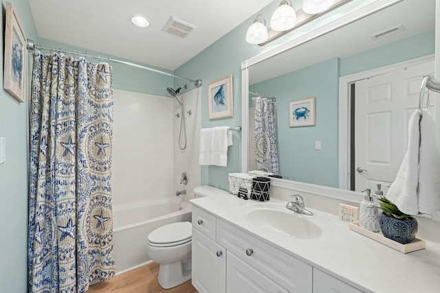 1111 Santa Rosa Blvd Unit 106, Fort Walton Beach, FL 32548 - full bathroom with shower / bath combo with shower curtain, vanity, and toilet