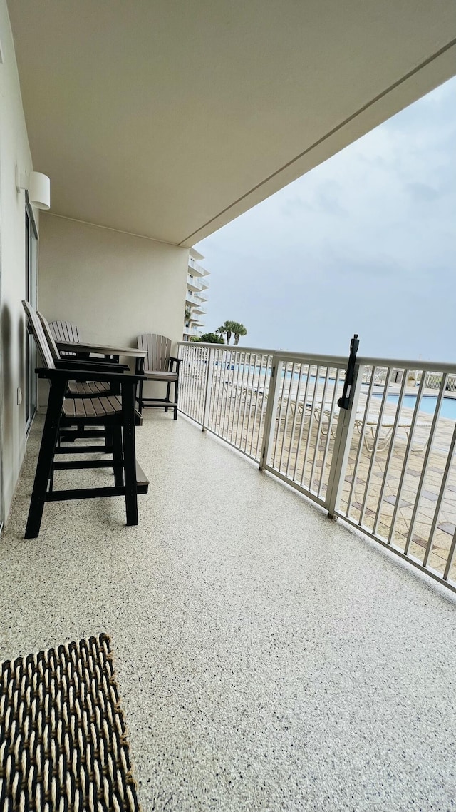 1111 Santa Rosa Blvd Unit 106, Fort Walton Beach, FL 32548 - balcony featuring a view of the beach and a water view