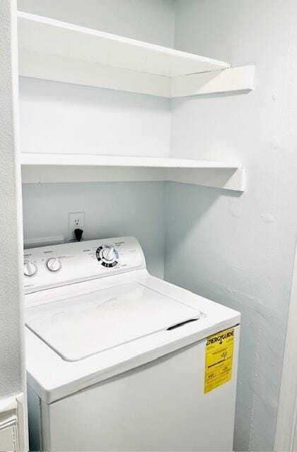 laundry room featuring washer / dryer