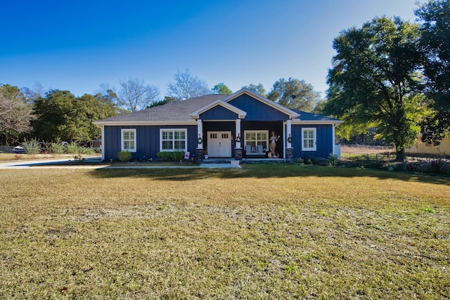 craftsman-style home with a front lawn