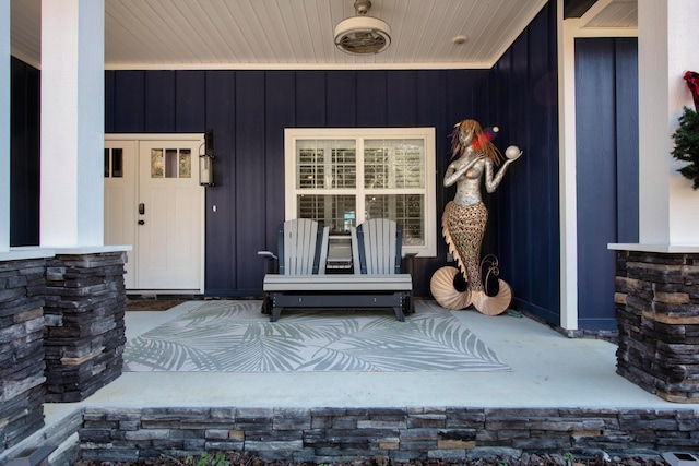 doorway to property featuring a porch