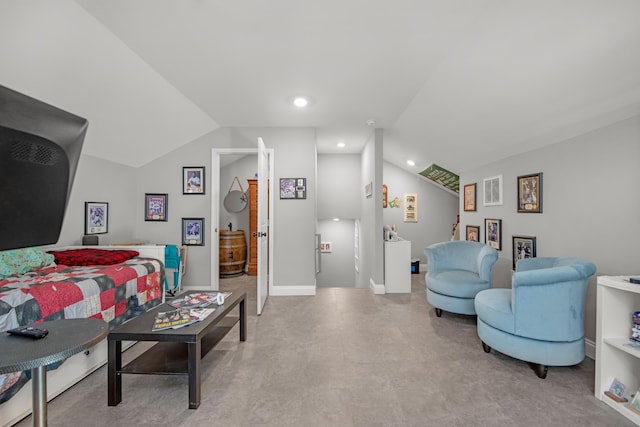 living room featuring vaulted ceiling