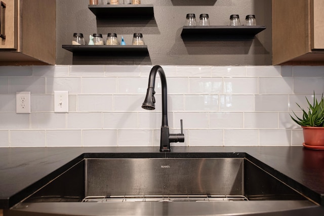 room details with sink and tasteful backsplash