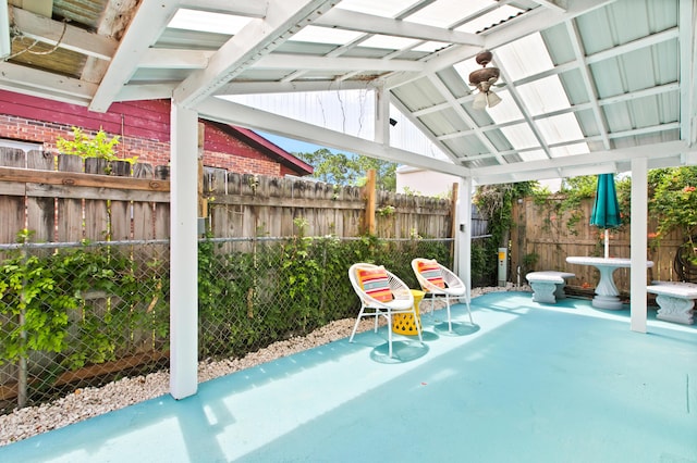 view of patio / terrace featuring ceiling fan