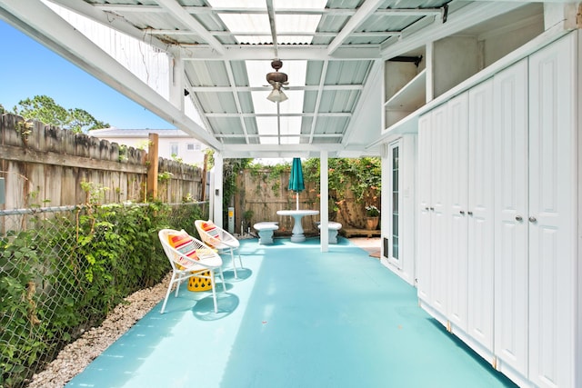 view of swimming pool with a patio and fence