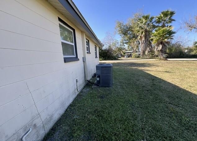 view of yard featuring central AC