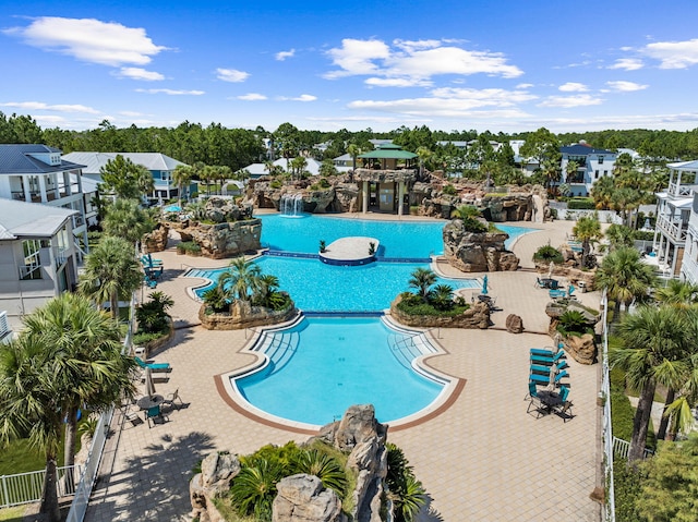 258 Tropical Breeze Dr, Santa Rosa Beach, FL 32459 - community pool featuring view of wooded area
