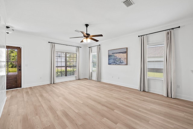 258 Tropical Breeze Dr, Santa Rosa Beach, FL 32459 - spare room with light wood-style flooring, a ceiling fan, plenty of natural light, and crown molding