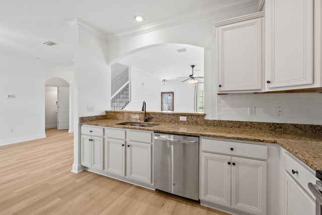 258 Tropical Breeze Dr, Santa Rosa Beach, FL 32459 - kitchen with dishwasher, ceiling fan, arched walkways, ornamental molding, and light wood-type flooring