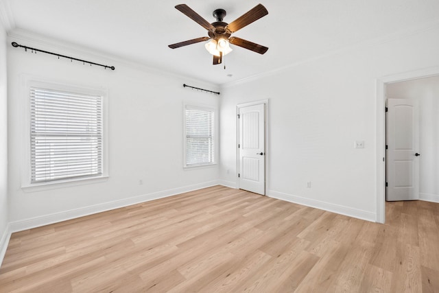 258 Tropical Breeze Dr, Santa Rosa Beach, FL 32459 - unfurnished bedroom featuring crown molding, light wood-style flooring, and a ceiling fan