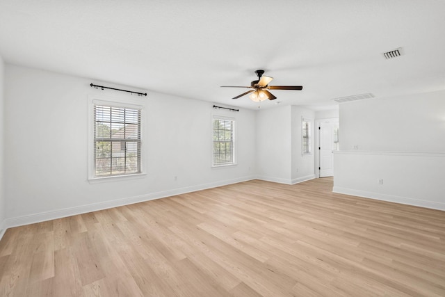 258 Tropical Breeze Dr, Santa Rosa Beach, FL 32459 - spare room with a ceiling fan and light wood finished floors