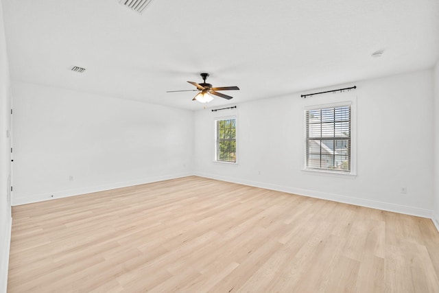 258 Tropical Breeze Dr, Santa Rosa Beach, FL 32459 - unfurnished room featuring ceiling fan and light wood-style flooring