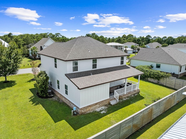 258 Tropical Breeze Dr, Santa Rosa Beach, FL 32459 - rear view of house featuring a shingled roof and a fenced backyard